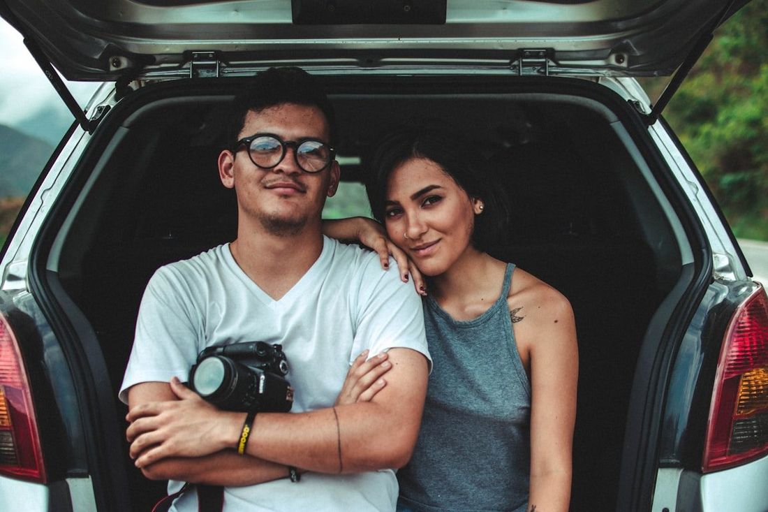 A couple with their SUV